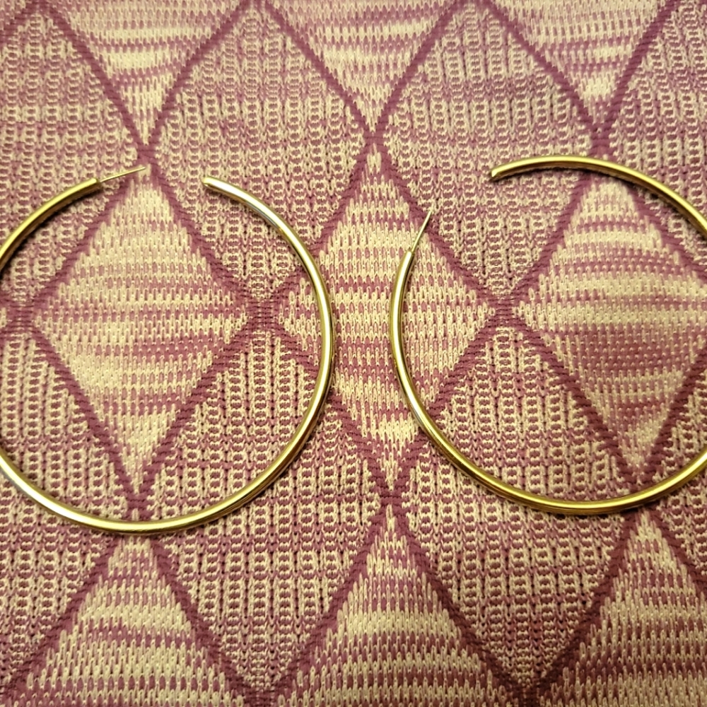 Large hoops. Gold.